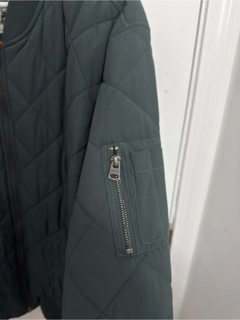 Levi's Quilted Bomber Jacket in Deep Green with Orange Lining
